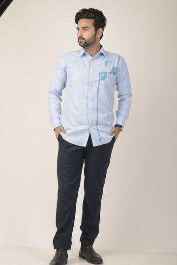 light blue long-sleeve shirt with a subtle textured fabric