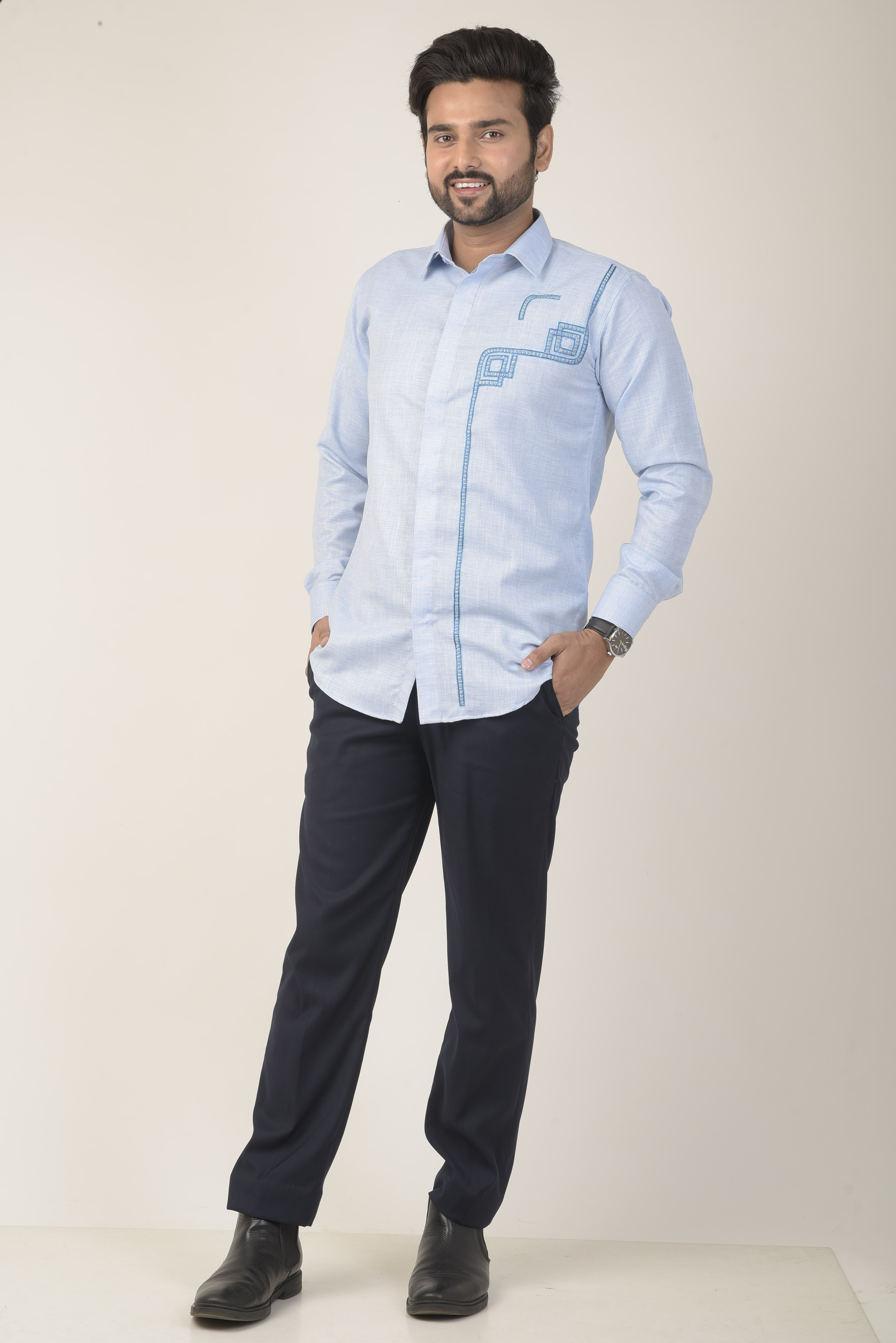 light blue long-sleeve shirt with a subtle textured fabric