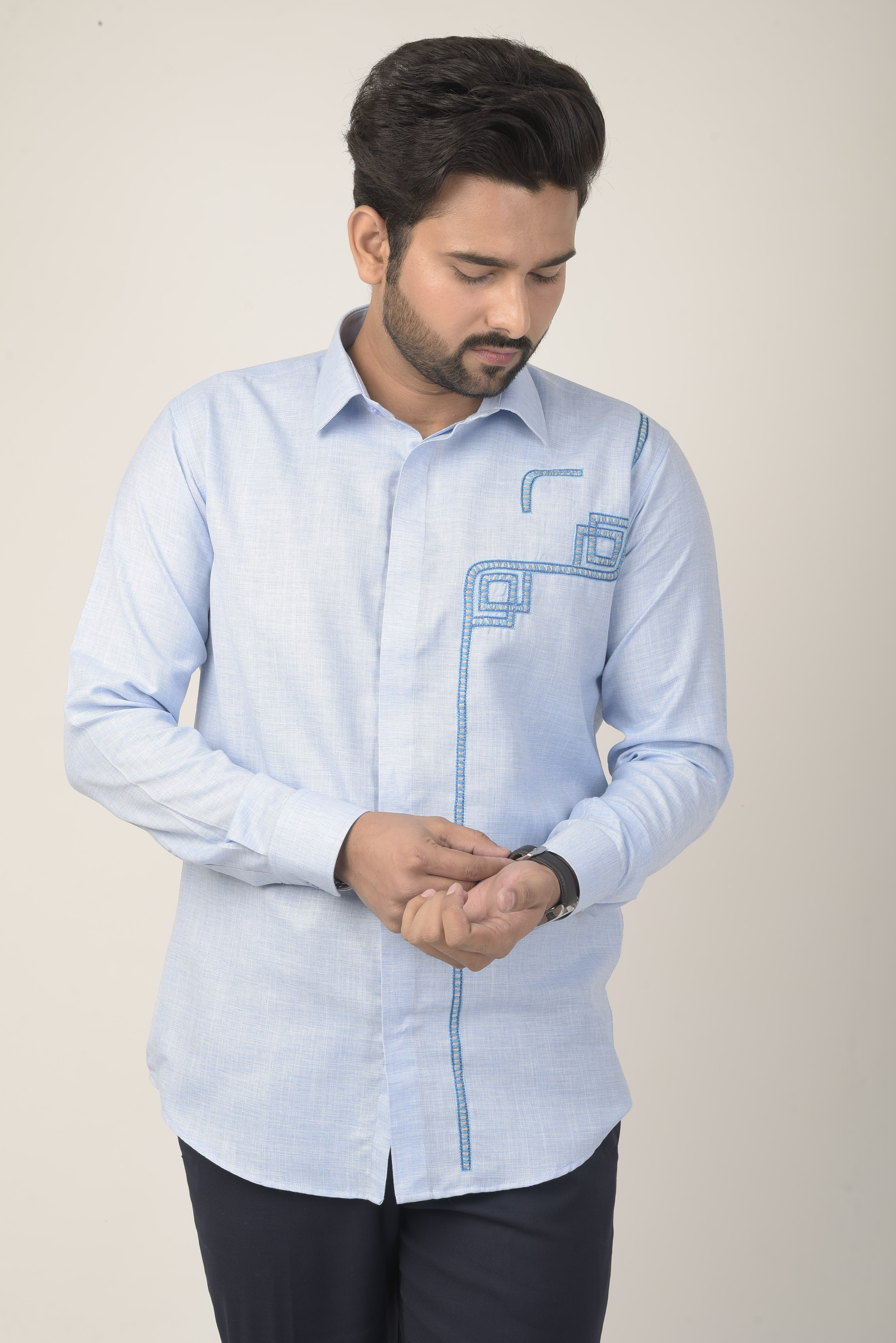 light blue long-sleeve shirt with a subtle textured fabric