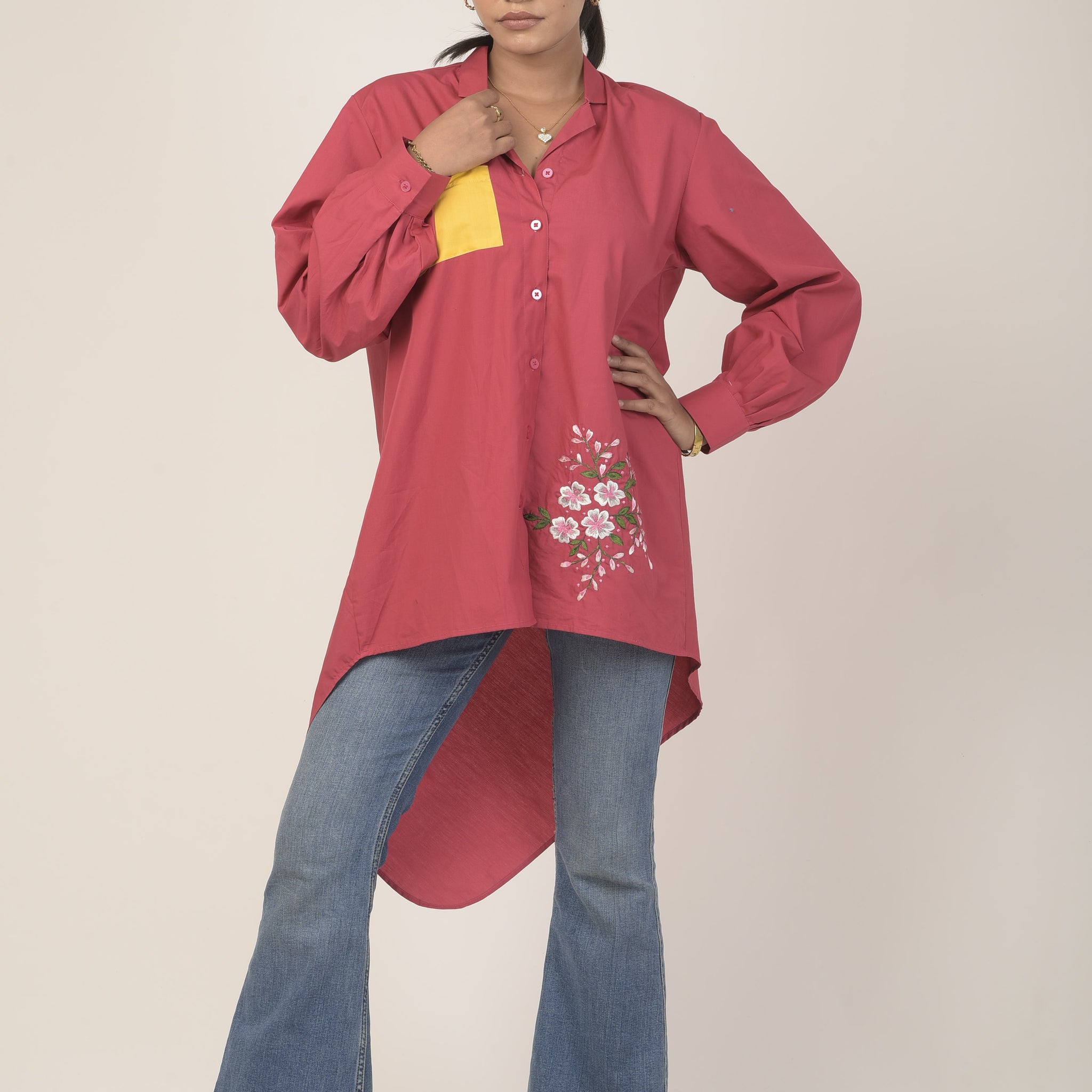 Magenta high-low shirt with floral embroidery