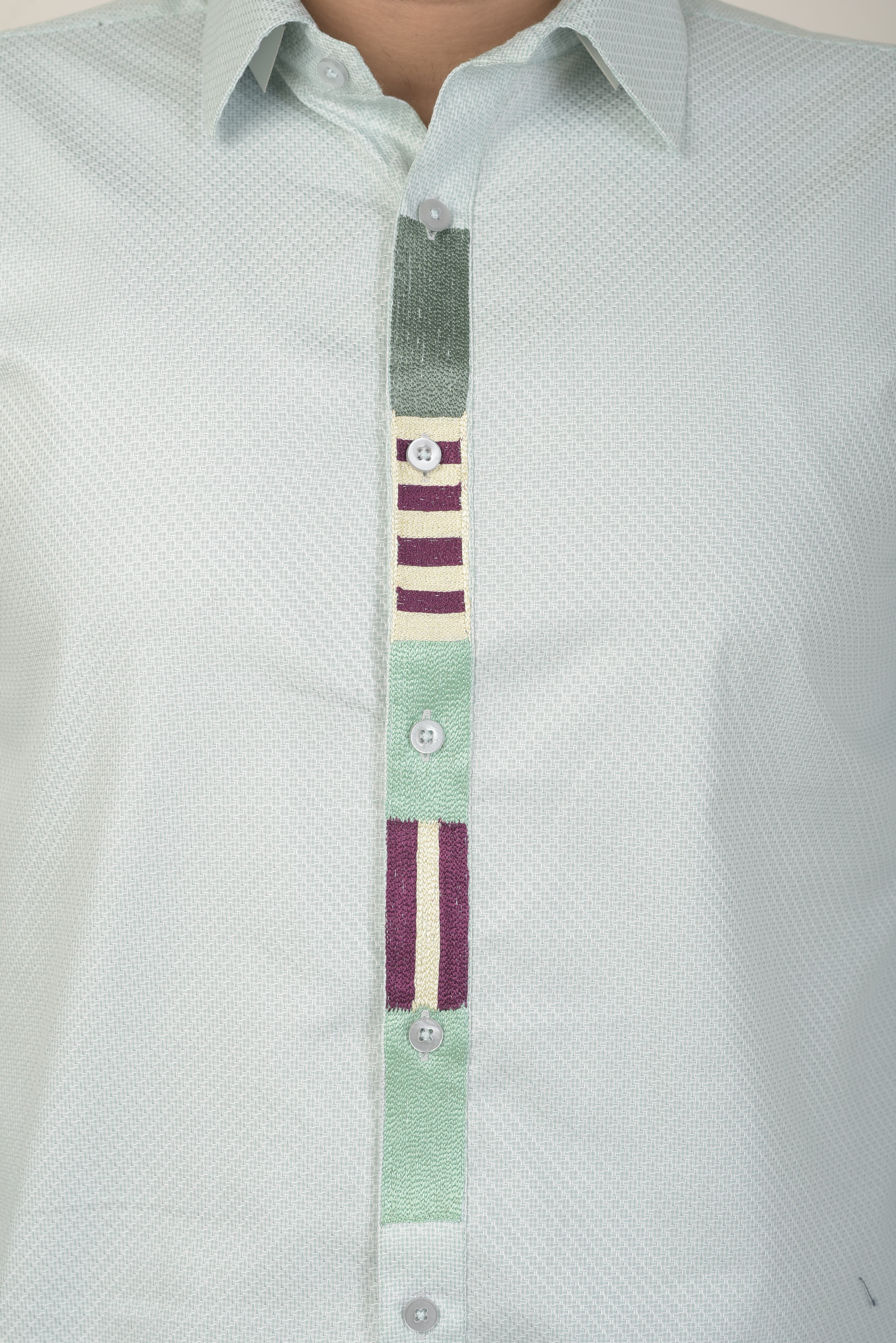 Mint green base shirt with a micro-patterned texture